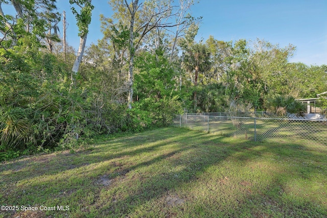 view of yard with fence