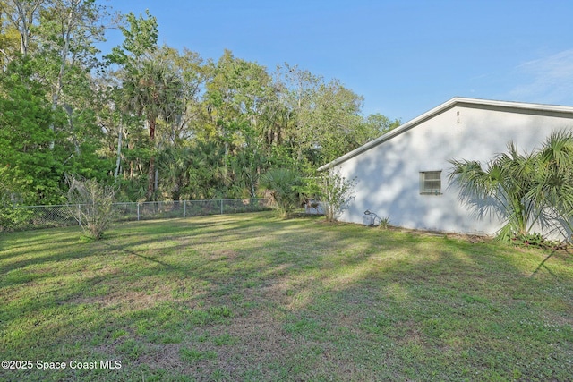 view of yard featuring fence