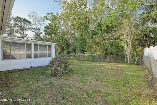 view of yard with a fenced backyard