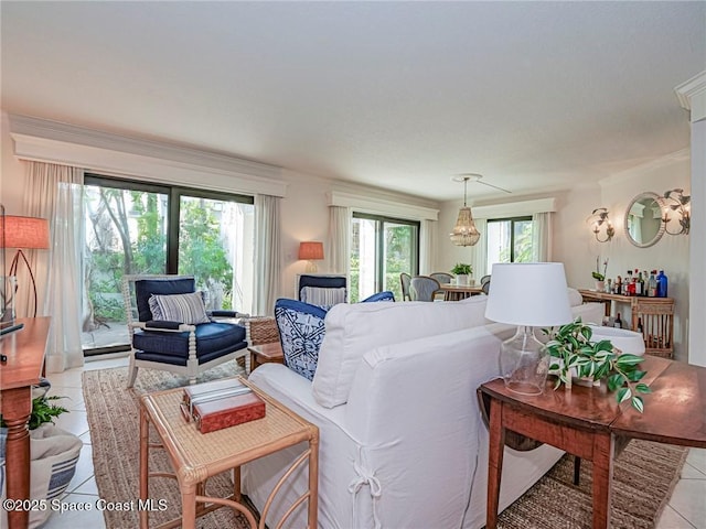 living area featuring light tile patterned floors and a notable chandelier