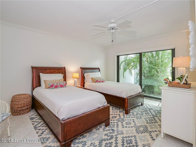 tiled bedroom with ceiling fan, ornamental molding, and access to exterior