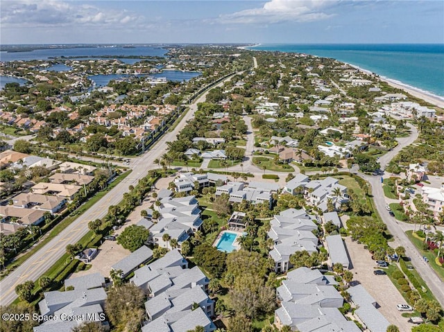 aerial view featuring a water view and a residential view