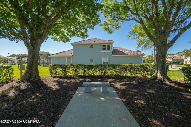 view of yard with a lanai