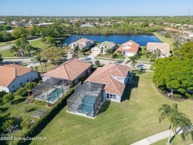 aerial view with a water view and a residential view