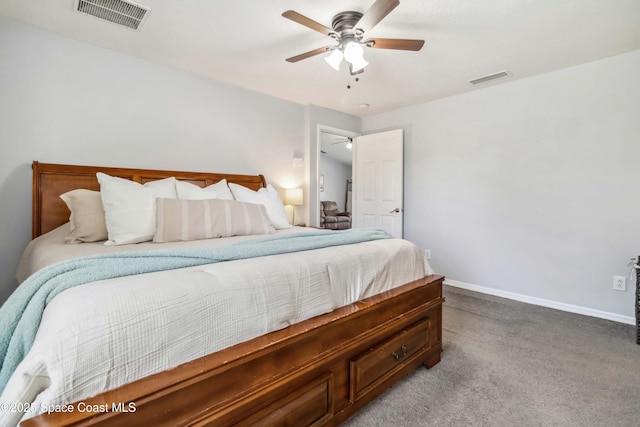 carpeted bedroom featuring visible vents, a ceiling fan, and baseboards