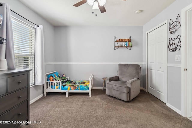 bedroom with carpet, baseboards, and ceiling fan