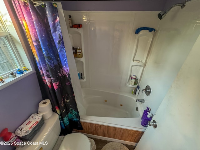 full bath featuring toilet and shower / tub combo