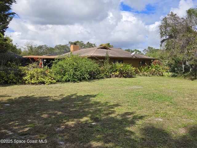 2001 Villa Espana Trl, Melbourne, FL 32935 - view of yard