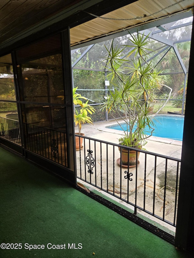 2001 Villa Espana Trl, Melbourne, FL 32935 - exterior space featuring a pool and a sunroom
