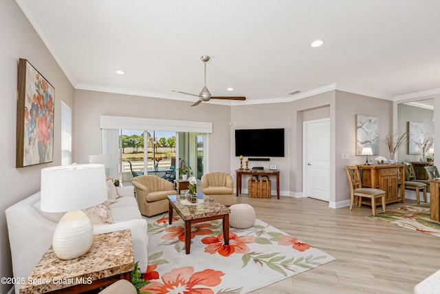 living area featuring light wood finished floors, recessed lighting, baseboards, and ornamental molding