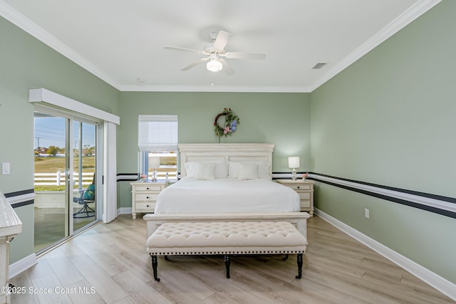 bedroom with light wood-type flooring, visible vents, ornamental molding, and access to outside