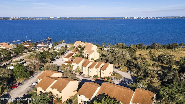 bird's eye view with a residential view and a water view