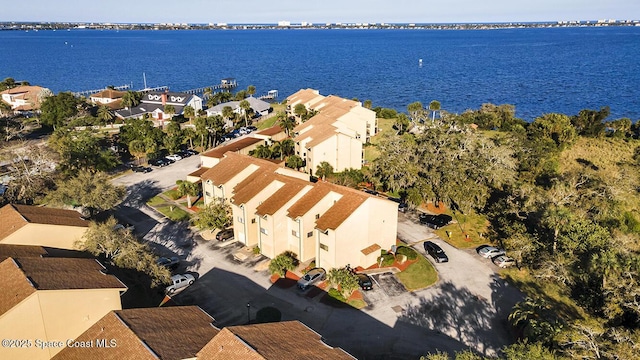 aerial view featuring a residential view and a water view