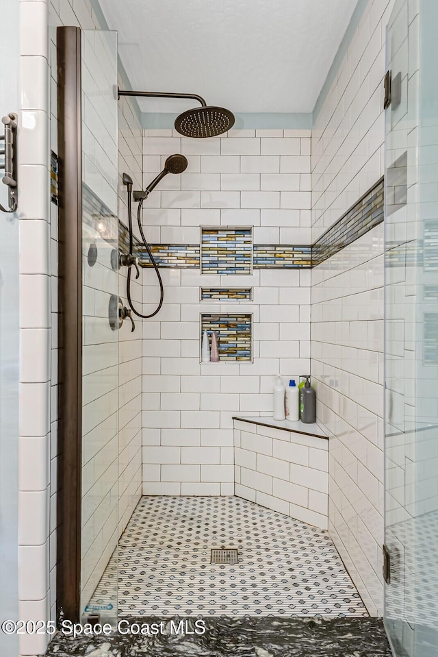 full bathroom featuring a stall shower