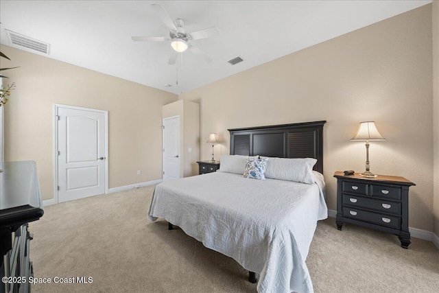 bedroom featuring light carpet, visible vents, and baseboards