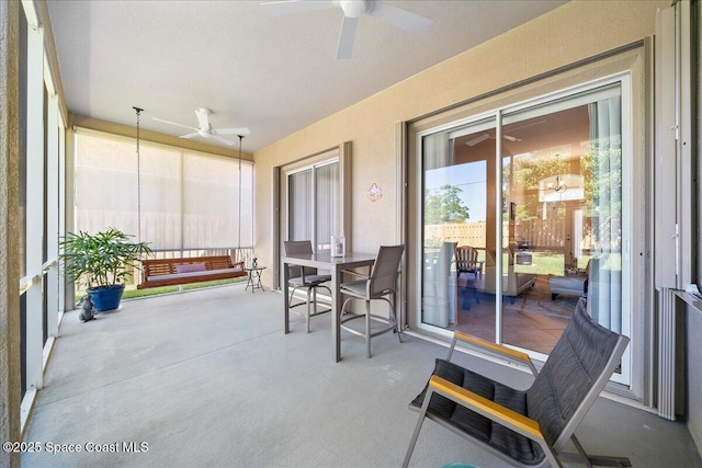 view of patio with ceiling fan