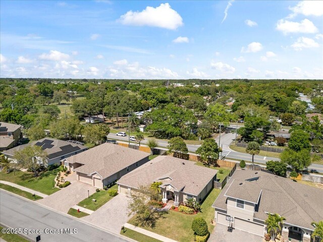 birds eye view of property with a residential view