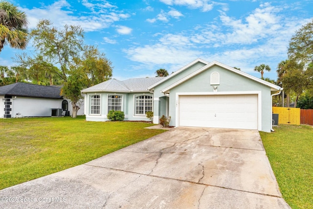 single story home featuring an attached garage, fence, a front yard, stucco siding, and driveway