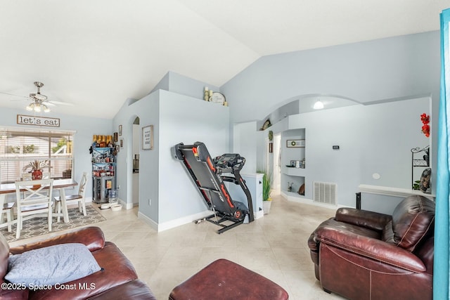 living room featuring visible vents, ceiling fan, lofted ceiling, light tile patterned flooring, and arched walkways