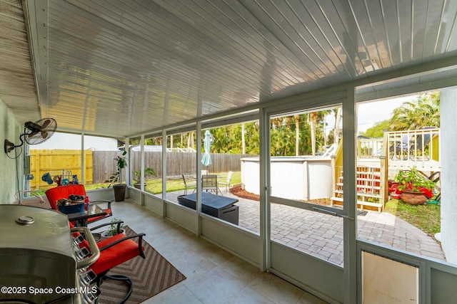 sunroom with plenty of natural light