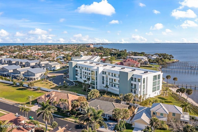 birds eye view of property featuring a residential view and a water view