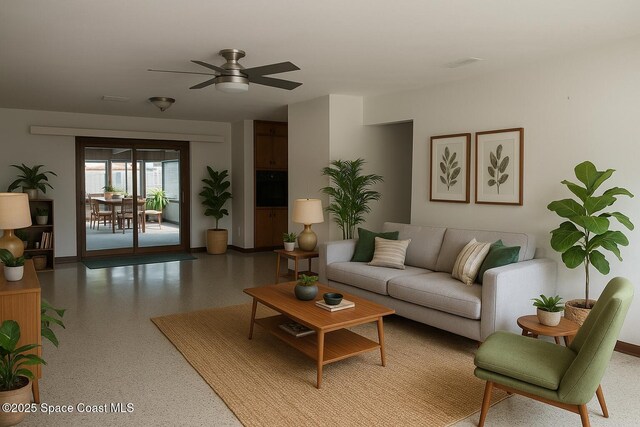 324 Harbor Dr, Cape Canaveral, FL 32920 - living area with a ceiling fan, dark speckled floor, and baseboards