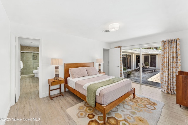 bedroom with visible vents, baseboards, access to exterior, ensuite bathroom, and light wood-type flooring