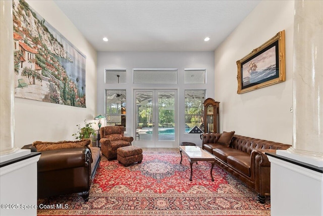 living room with recessed lighting and french doors