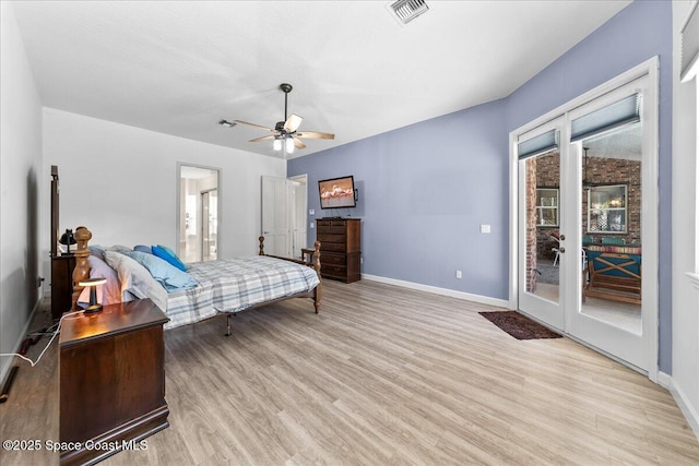 bedroom with access to exterior, baseboards, visible vents, and light wood-type flooring