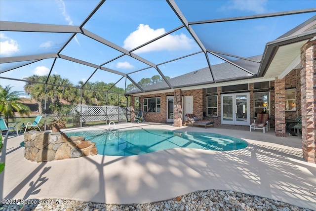 pool featuring french doors, a patio, and a lanai