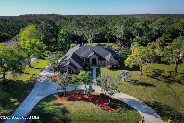 aerial view with a wooded view