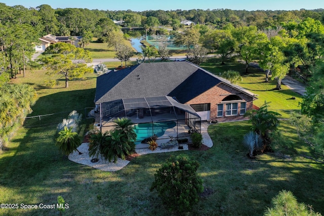 aerial view with a wooded view