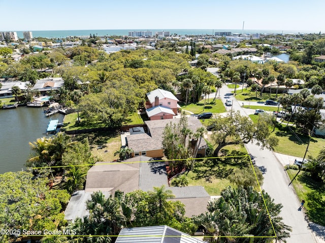 bird's eye view with a water view