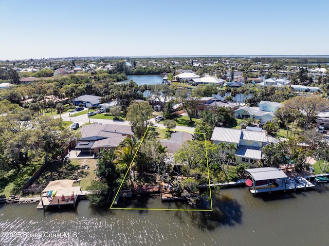 aerial view featuring a water view and a residential view