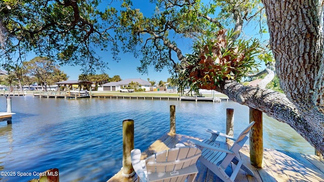 view of dock with a water view