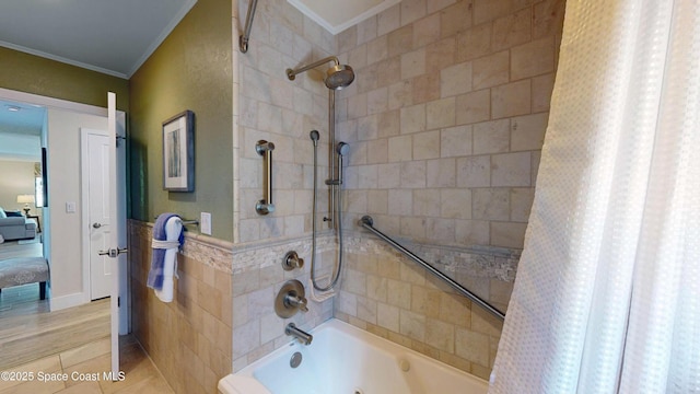 ensuite bathroom with tile patterned flooring, tile walls, ornamental molding, ensuite bath, and shower / bathtub combination with curtain