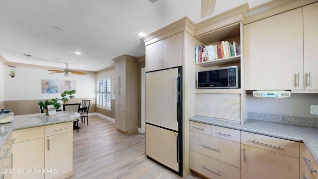 kitchen featuring a ceiling fan, visible vents, light wood-style flooring, recessed lighting, and stainless steel fridge