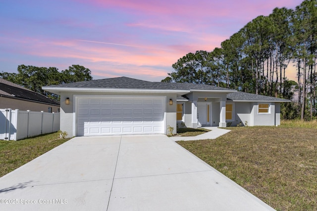 531 Ortega St SE, Palm Bay, FL 32909 - prairie-style home with stucco siding, a front yard, and fence