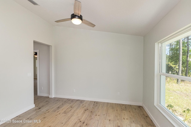 531 Ortega St SE, Palm Bay, FL 32909 - unfurnished room featuring visible vents, light wood-style flooring, baseboards, and ceiling fan