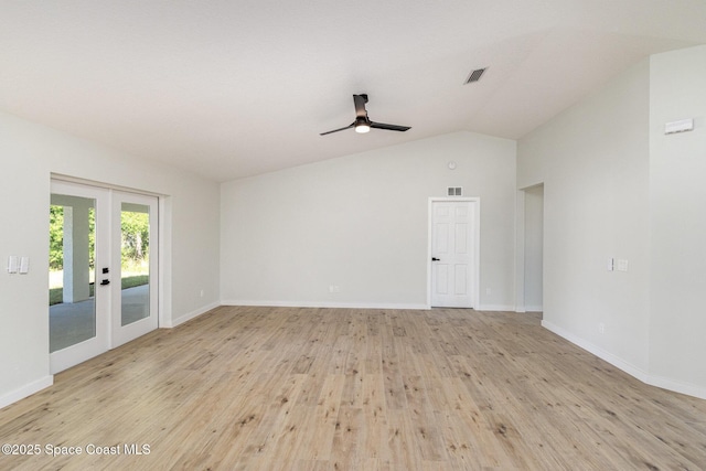 531 Ortega St SE, Palm Bay, FL 32909 - unfurnished room with visible vents, a ceiling fan, french doors, light wood-style floors, and vaulted ceiling