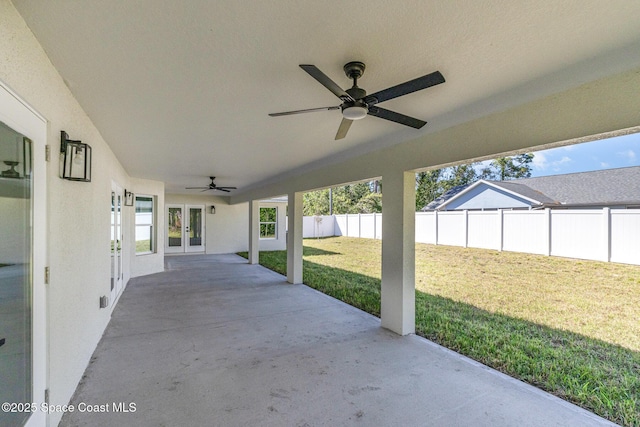 531 Ortega St SE, Palm Bay, FL 32909 - view of patio / terrace featuring a ceiling fan, french doors, and a fenced backyard