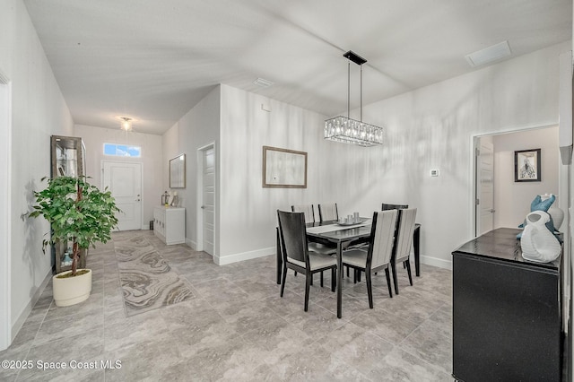 dining space with baseboards