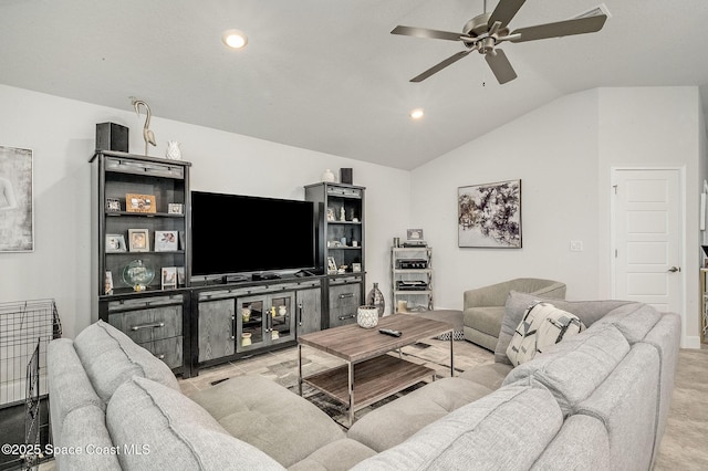 living area with recessed lighting, ceiling fan, and vaulted ceiling