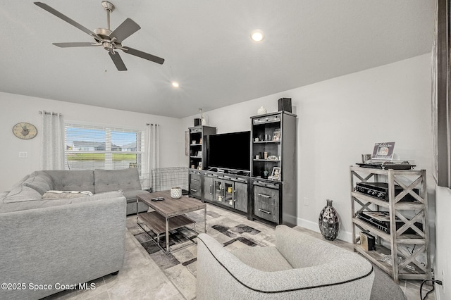 living area featuring recessed lighting, a ceiling fan, and vaulted ceiling