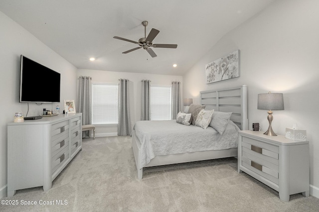 bedroom featuring vaulted ceiling, recessed lighting, light colored carpet, and ceiling fan