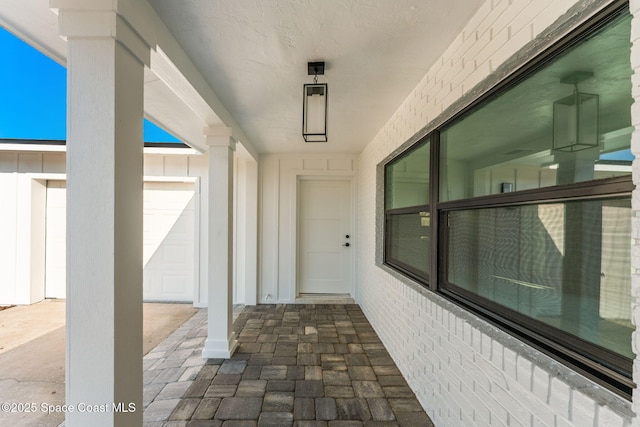 property entrance with board and batten siding