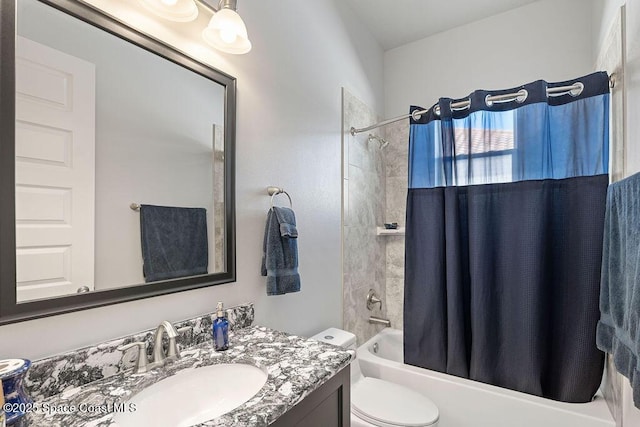 full bath with shower / bath combo with shower curtain, toilet, and vanity