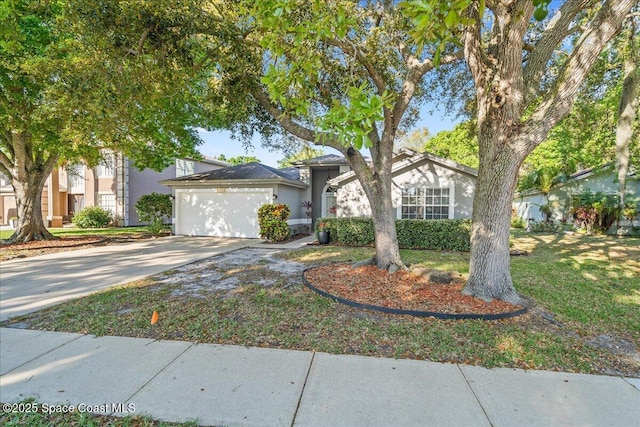 ranch-style house featuring stucco siding, driveway, a front lawn, and a garage