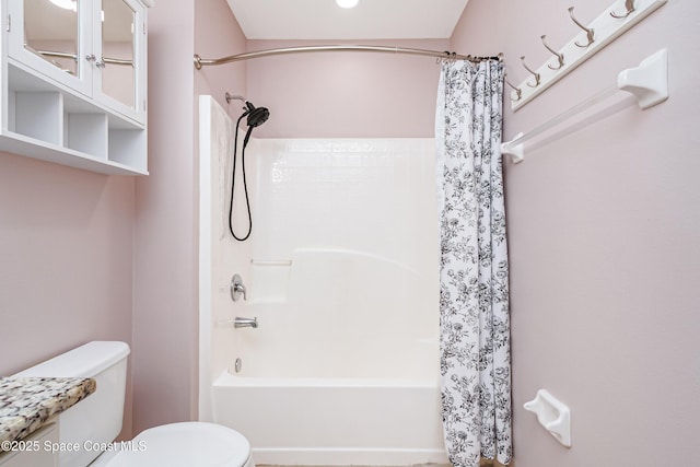 2705 Revolution St Unit 106, Melbourne, FL 32935 - bathroom featuring shower / bathtub combination with curtain and toilet