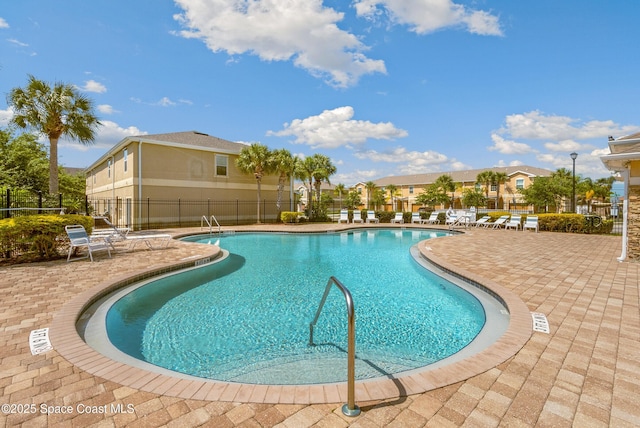 2705 Revolution St Unit 106, Melbourne, FL 32935 - community pool with fence and a patio area
